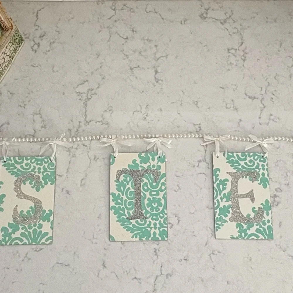 Turquoise and Silver Decorative Letter Banner